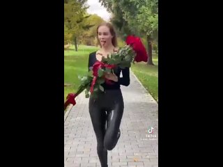 girl in leggings and flowers