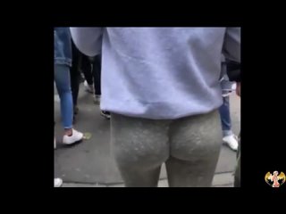 round ass of a young girl spying on a girl on the street