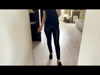 young girl reviews her new leather leggings